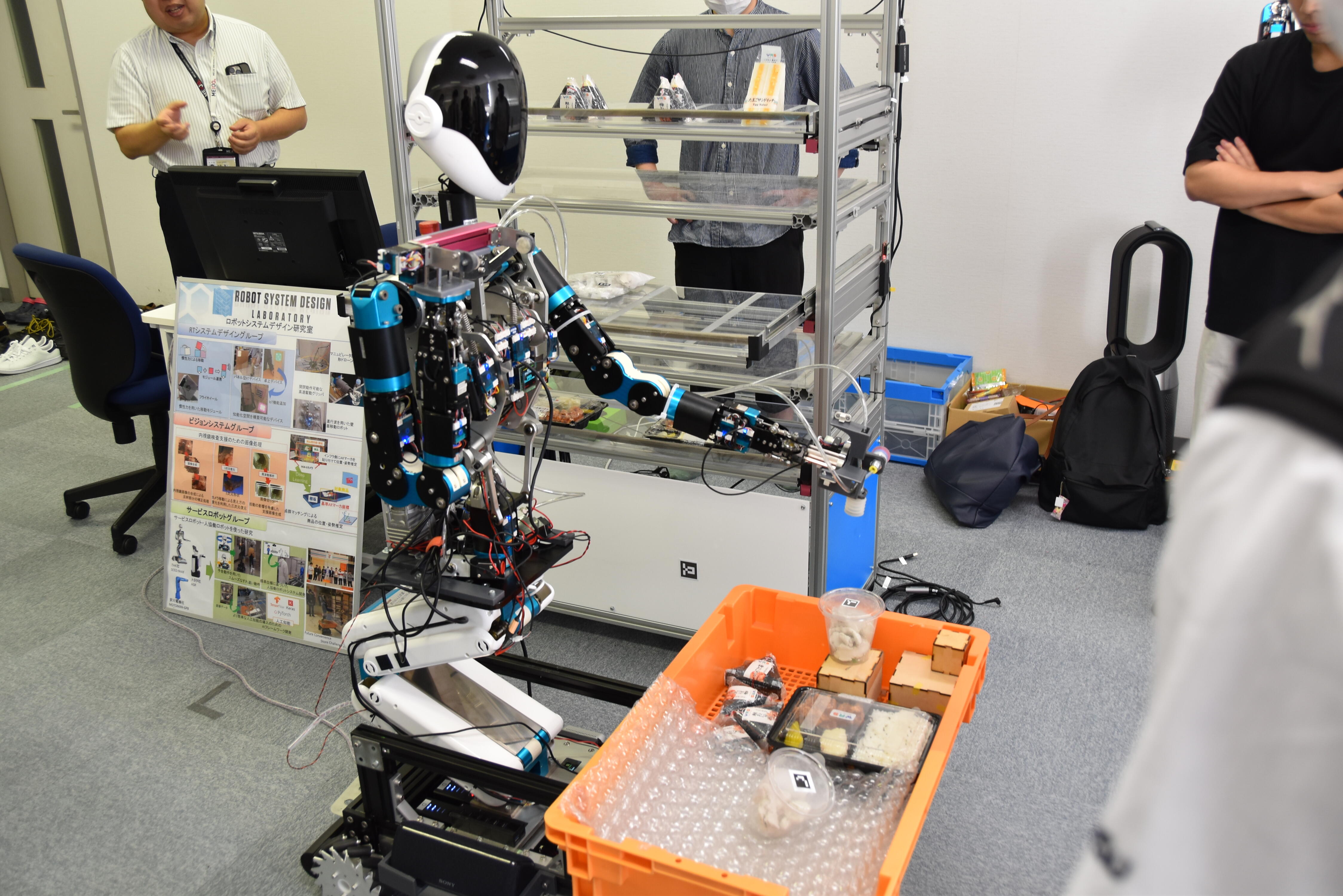 大原研究室のコンビニの陳列ロボットのデモ